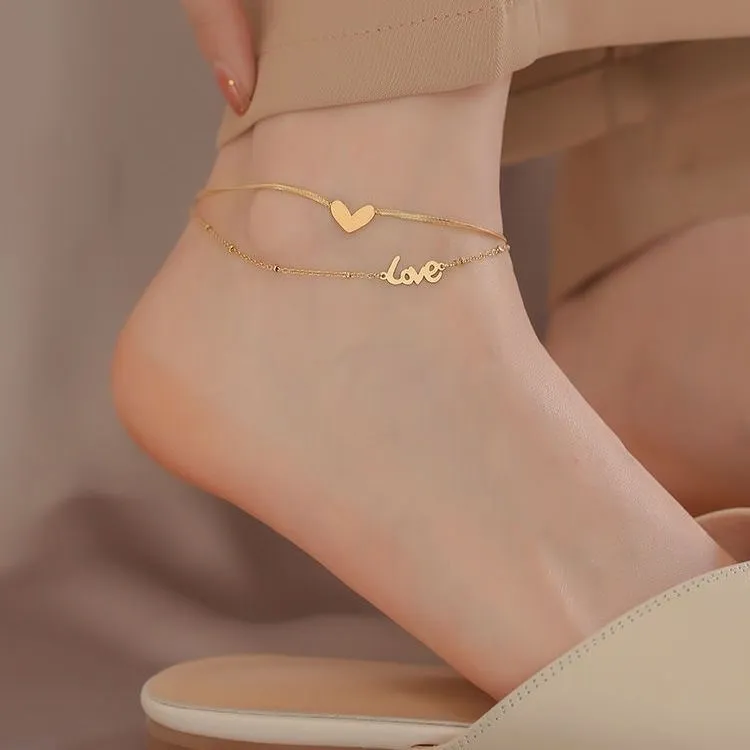 Chaîne de cheville réglable en acier inoxydable pour femme, double couche, motif cœur doré et perles serpent, idéale pour la plage et l'été
